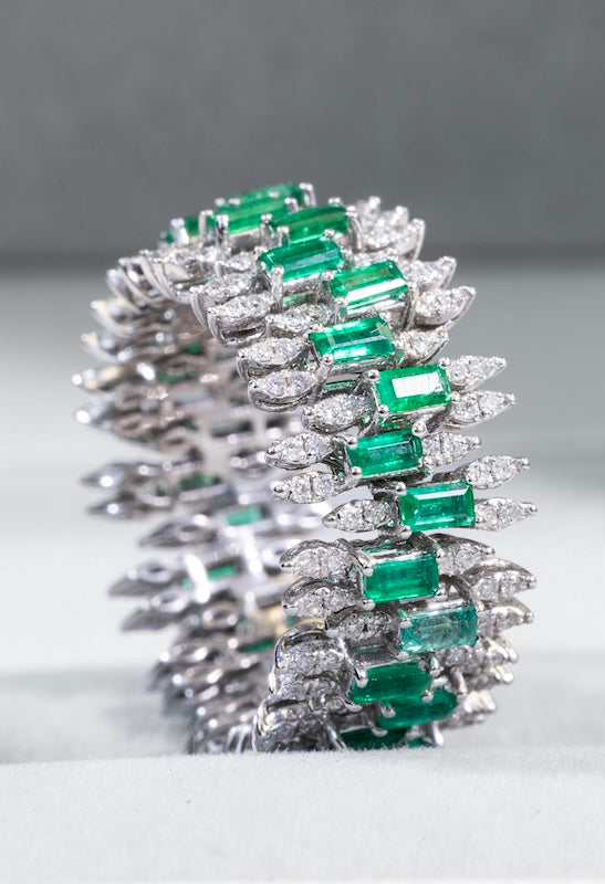 Diamond and emerald ring in 18K Gold